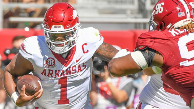 Arkansas quarterback KJ Jefferson tries to break free against Alabama.
